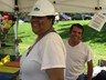 Saundra and Dan work the booth